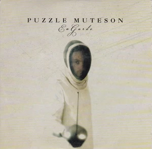 PUZZLE MUTESON En Garde ( UK 10 Track Promo CD ) - Bild 1 von 3