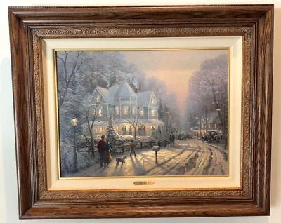 THOMAS KINKADE A HOLIDAY GATHERING CHRISTMAS COTTAGE IX 3531/6950 FRAMED CANVAS - Image 1 of 4