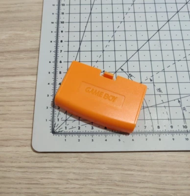 Nintendo Game Boy Advance GBA - Plasturgie, Cache pile orange non officiel - Photo 1/2