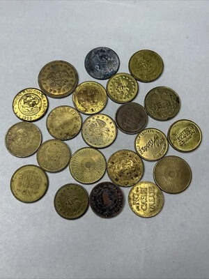 Brass coins lot of 21 assorted Chuck E Cheese planet fitness Dave & Buster’s Etc - Image 1 of 3