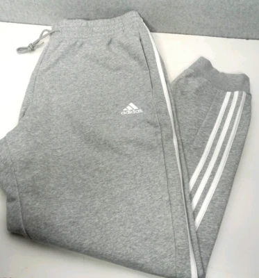 Pantalones deportivos Adidas Essentials polar puño cónico para hombre talla XL gris blanco Foto 1 de 4