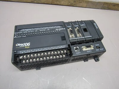 CONTROLADOR LÓGICO DIRECT LOGIC D0-06DR-D CON MÓDULOS D0-DCM Y H0-ECOM100 BONITO USADO Foto 1 de 4