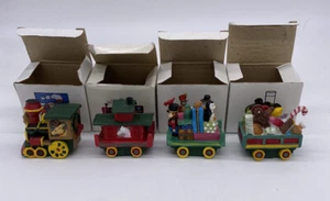 4 Piece Vintage Ceramic Christmas Train Set Santa Bear Toys Penguin Reindeer - Picture 1 of 12