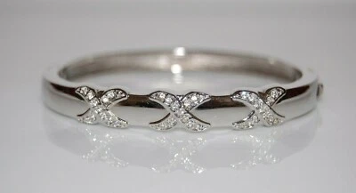 ELEGANT SILVERED METAL AND RHINESTONES X DESIGN STATEMENT HINGED CUFF BRACELET - Image 1 of 4