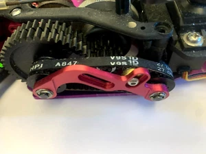 ALUMINUM REAR GEAR BELT TENSION MOUNT w/Wheelie P HPI SUPER NITRO RS4 2 speed - Picture 1 of 2