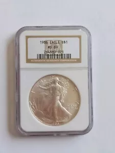 1986 S$1 American Silver Eagle NGC MS69 Coin Round - Picture 1 of 2