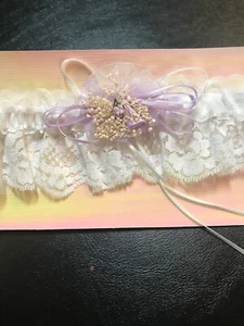 NEW WEDDING GARTER, FROM LOCAL WEDDING SHOP, NOW CLOSED. MANY LISTED.(GRY-99-22) - Picture 1 of 2