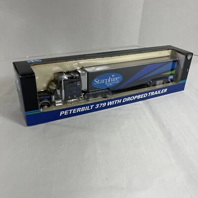 SpecCast 32905 PPG Starphire 1:64 Peterbilt 379 W/ Dropbed Trailer Die Cast - Image 1 of 4