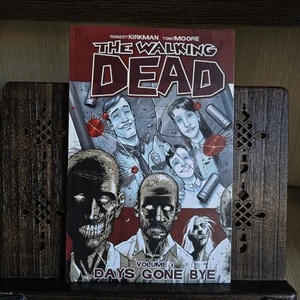The Walking Dead Vol. 1: Days Gone Bye — Robert Kirkman & Tony Moore 2011 - Picture 1 of 10