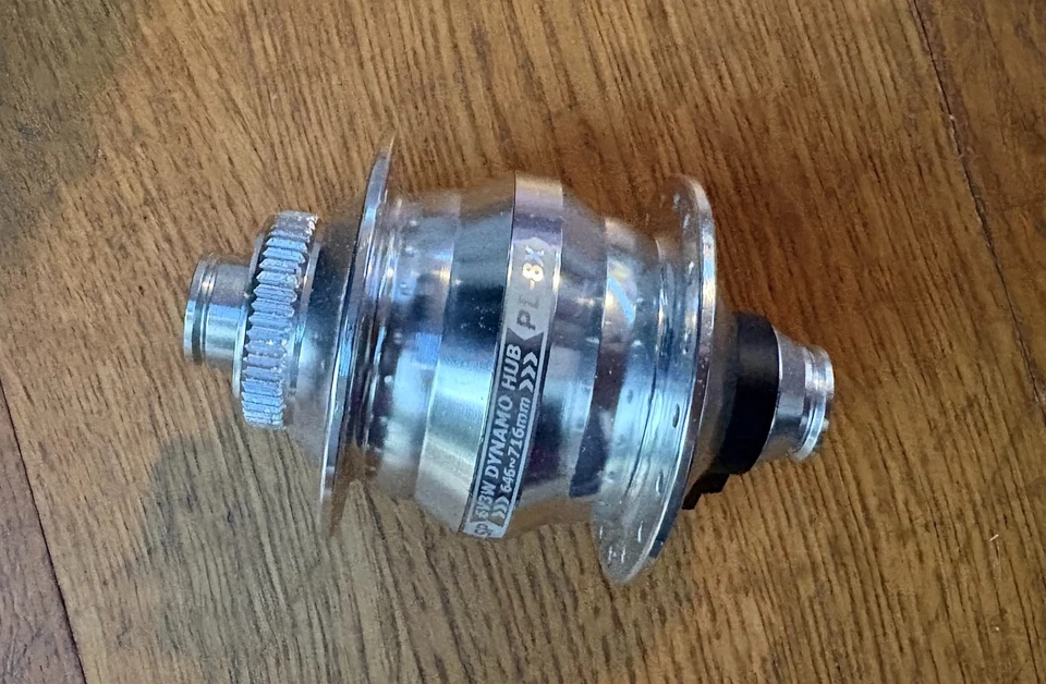 Obturador Precisión PL-8X-M- 12mm x 100mm Eje Pasante - Cerradura Central, 24/28/36h Plateado Foto 1 de 3