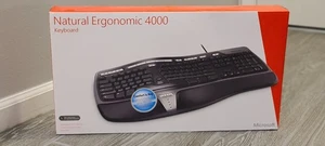 NEW SEALED Microsoft Natural Ergonomic 4000 B2M-00012 Keyboard MODEL 1048 RARE - Picture 1 of 2