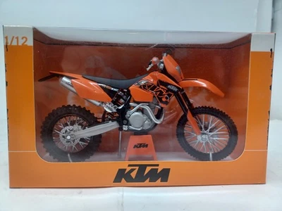 New Ray KTM 450 EXC Racing 07 off road 1:12 Diecast  - Image 1 of 3