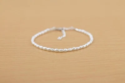 Pulseras unisex curativas con cuentas de piedras preciosas lisas con forma de tambor de perlas de agua dulce 6-8" Foto 1 de 4