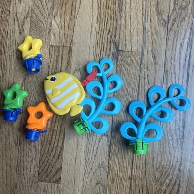 Baby Einstein Neptunes Ocean Discovery Jumper 3 estrellas, algas azules/piezas de peces Foto 1 de 2