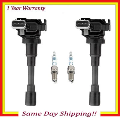 UF280 2 PIEZAS Bobina de encendido y 5304 2 piezas Bujía para 99-01 Suzuki Esteem Juego de 1,6 L Foto 1 de 4