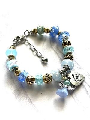 Pulsera con dije europea azul y dorado conciencia del cáncer se adapta a tamaños de muñeca 7,5-8,5" Foto 1 de 4