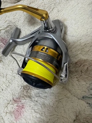 Mulinello da spinning argento/oro - Immagine 1 di 3