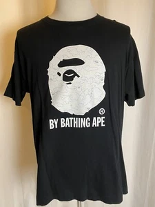 A Bathing Ape (Bape) x Kaws Vintage Men’s XL Black T Shirt White Ape Head X Eyes - Picture 1 of 12