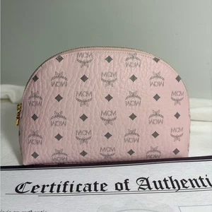 Auténtica bolsa cosmética de cuero rosa MCM con certificado - Imagen 1 de 9