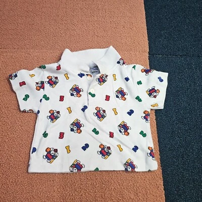 Camiseta polo vintage Perfect Pals perro béisbol bebé SS 18M blanca U5a Foto 1 de 4