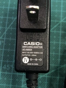 Original Casio AD-A60024 AC/DC Adapter 6V 240mA OEM Switching VG - Bild 1 von 5
