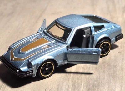 2020 Matchbox Moving Parts GTT20 '82 Datsun 280 ZX Sky Blue Mtflk/Gold w/5sp NM - Image 1 of 4