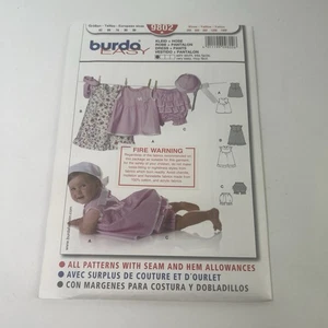 Burda Sewing Pattern 9802 Baby Infant Dress & Pants Sizes 3M - 18M - Picture 1 of 8