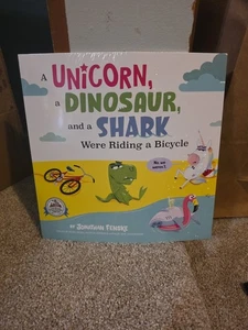A Unicorn, A Dinosaur, And A Shark Were Riding A Bicycle Paperback - Picture 1 of 1
