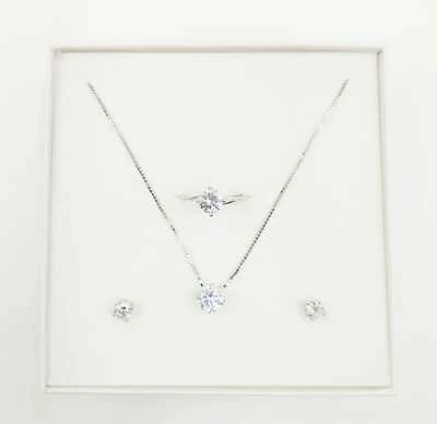 1 COLLANA PUNTO LUCE 1 ANELLO SOLITARIO 1 PAIO DI ORECCHINI PUNTO LUCE IN REGALO - Immagine 1 di 4