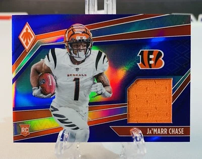 Ja’Marr Chase 2021 Panini Phoenix Rookie Card Jersey Patch 75/99 SP #RJM-JMC - Image 1 of 2