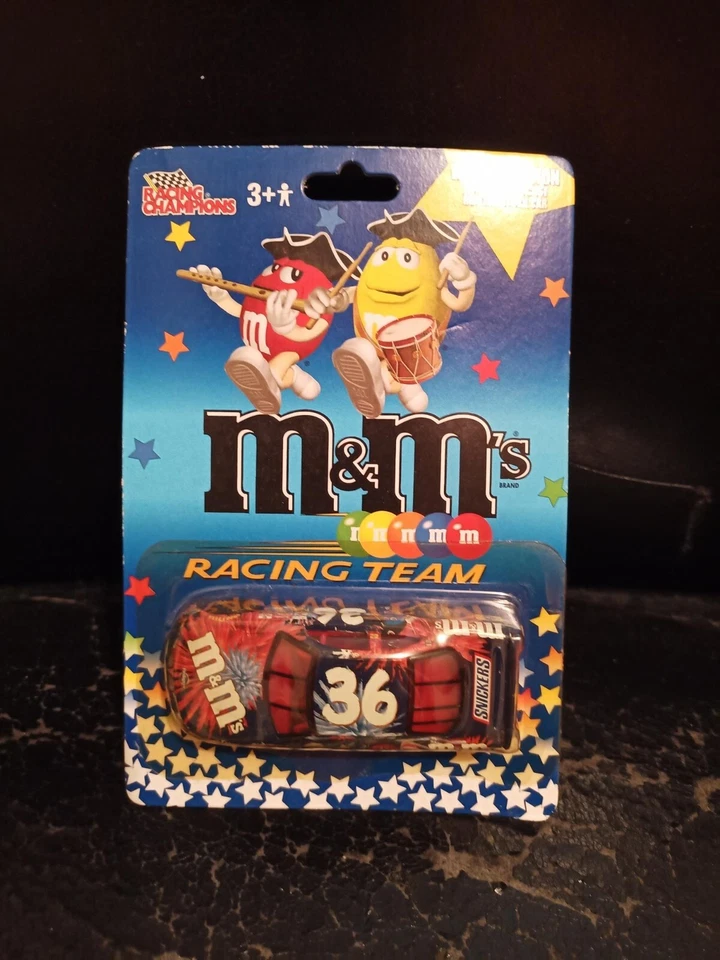 1/64 NASCAR 2002 KEN SCHRADER M&M'S 4TH OF JULY PATRIOT  RACING CHAMPIONS - Image 1 of 1