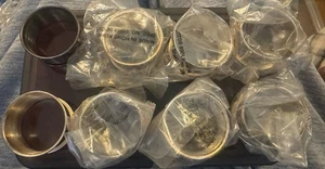 Anelli per tovaglioli in metallo (set di 8) - Foto 1 di 1