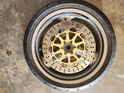 2001 DUCATI 748 FRONT WHEEL RIM WITH ROTORS NO DAMAGE TIRE LIKE 40% TRED - Image 1 of 2