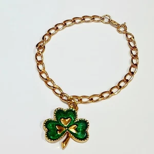 Brazalete Avon tono dorado con trébol verde - Imagen 1 de 3