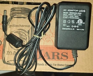 Salom 68300055-0000 UDS AC Adapter Netzteil Ausgang 12VDC 750mA - Bild 1 von 1