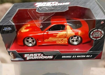 JADA TOYS.. FAST AND FURIOUS.. ORANGE JLS MAZDA RX 7.. DIECAST.. NEW - Image 1 of 4