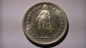 Moneda suiza 1976 a prueba de 2 francos rara 5130 acuñada Helvetia y escudo - Imagen 1 de 16