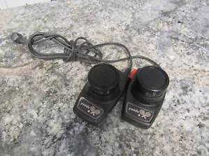 Vintage ATARI 2600 Paddle Controllers Set of (2) Tied to same Cable - Picture 1 of 6