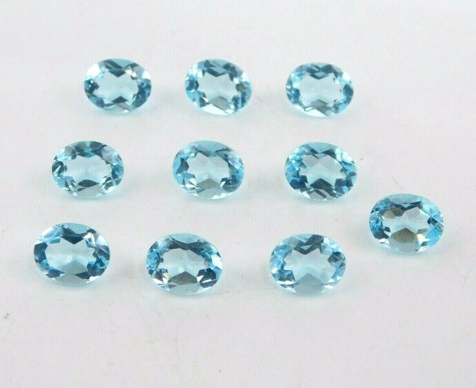 Созданный в лаборатории голубой топаз овальной огранки россыпью 23,50 карата 10 шт. 8X10 мм C-4395 - Изображение 1 из 1