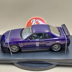AUTOart 1/18 Nissan Skyline GT-R R34 1999 Midnight Purple Performance 77304 - Picture 1 of 23