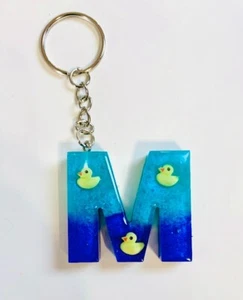 Duckie blau/türkis Harz Schlüsselanhänger Armband - Bild 1 von 1