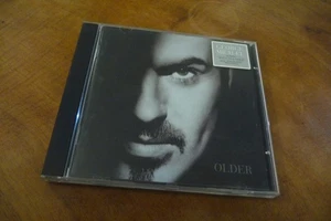 GEORGE MICHAEL CD OLDER. STICKER . JESUS TO A CHILD/ FASTLOVE... - Foto 1 di 4