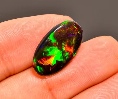 Cabinas de ópalo etíope negro natural de 4,01 quilates con forma ovalada piedras preciosas sueltas 18X10X3 mm Foto 1 de 4