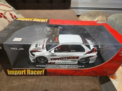 JADA IMPORT RACER MITSUBISHI MOTORS LANCER EVOLUTION VIII 1:18 TOYO TIRES HKS - Image 1 of 4