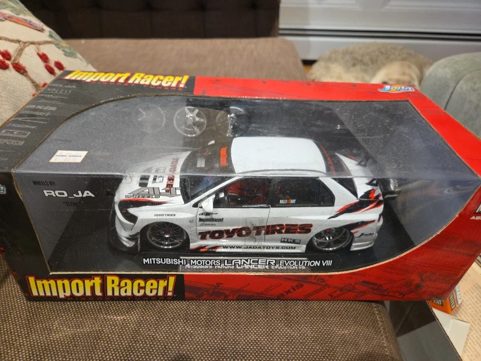 JADA IMPORT RACER MITSUBISHI MOTORS LANCER EVOLUTION VIII 1:18 TOYO TIRES HKS - Image 1 of 4