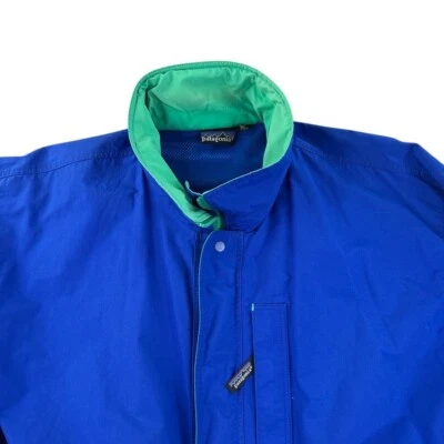 Chaqueta cortavientos vintage Patagonia para hombre grande azul cremallera completa años 90 exterior Foto 1 de 4