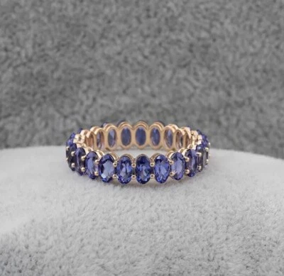 Anillo banda de eternidad completa de tanzanita de corte ovalado creado en laboratorio talla 9  Foto 1 de 4
