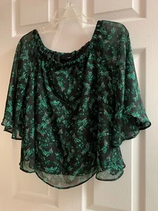 ANA XS SCHWARZ+GRÜN BLÄTTERDRUCK ON-OFF SHOULDER BOHO BAUER TOP-FLATTER SLV(70a) - Bild 1 von 3