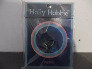 Vintage Années 70 Bague Holly Hobbie Neuve avec emballage Modèle Tenue bleue - Bild 1 von 3
