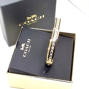 Brazalete con bisagras Coach New York Signature logotipo C en cristal pavimentado negro y dorado - Imagen 1 de 5